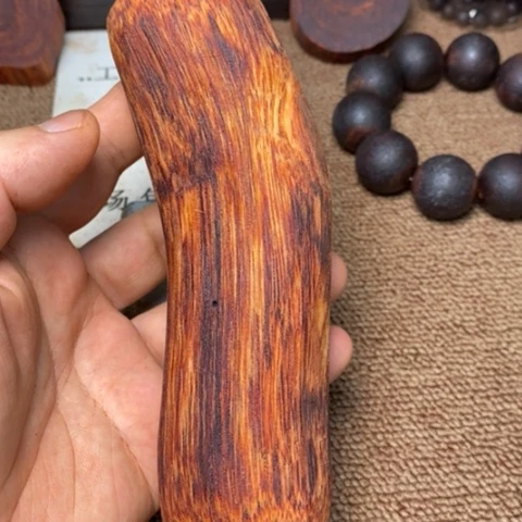 藤类228克降真香彩虹油超一档手把件