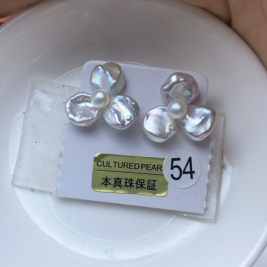 合金淡水珍珠耳钉苏****记