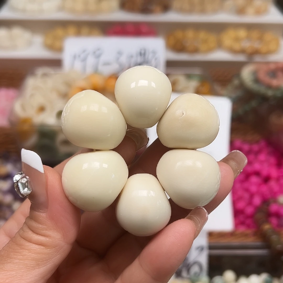 菩提根/象牙果手串瑕疵卡25kt蒜瓣一条表面有裂