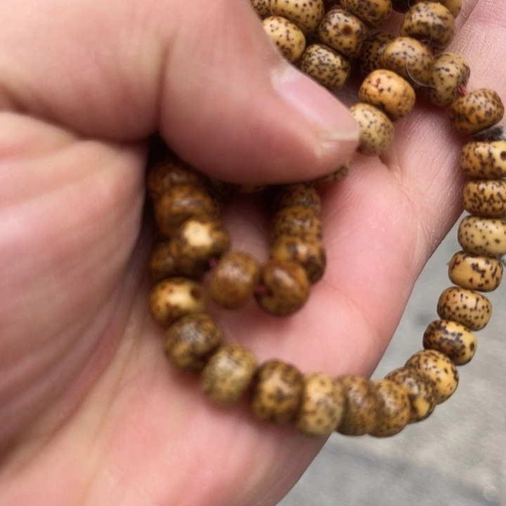 藏***服非洲檀香无事牌星月木串