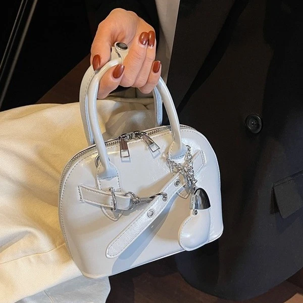 小众爱心包女2025新款百搭斜挎包春夏季手提贝壳包小拎包华维8003