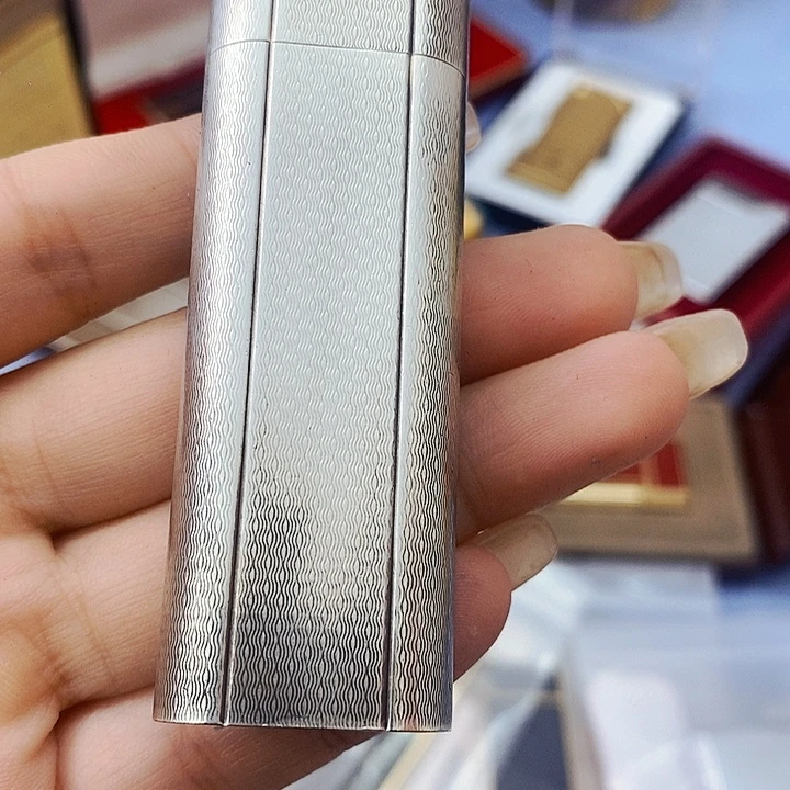 京***儿卡家银色钱纹打火机