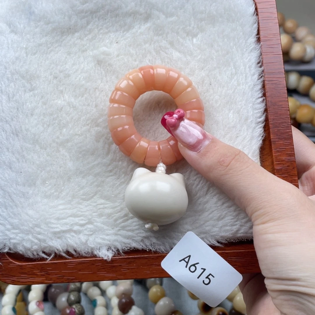 菩提根/象牙果吊坠瑕WA615猫头手捻12mm一串随机