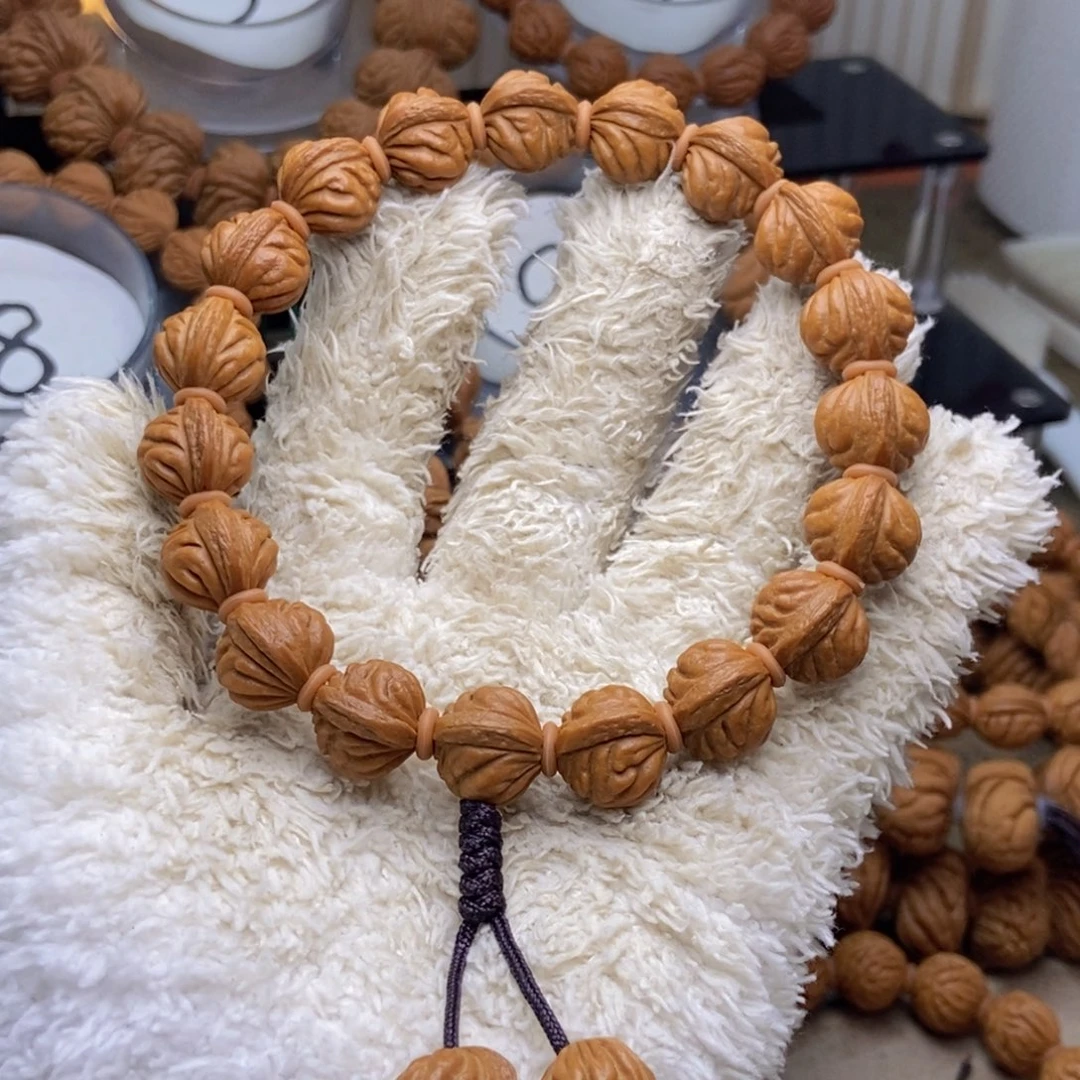 手串桃核闪电购 58