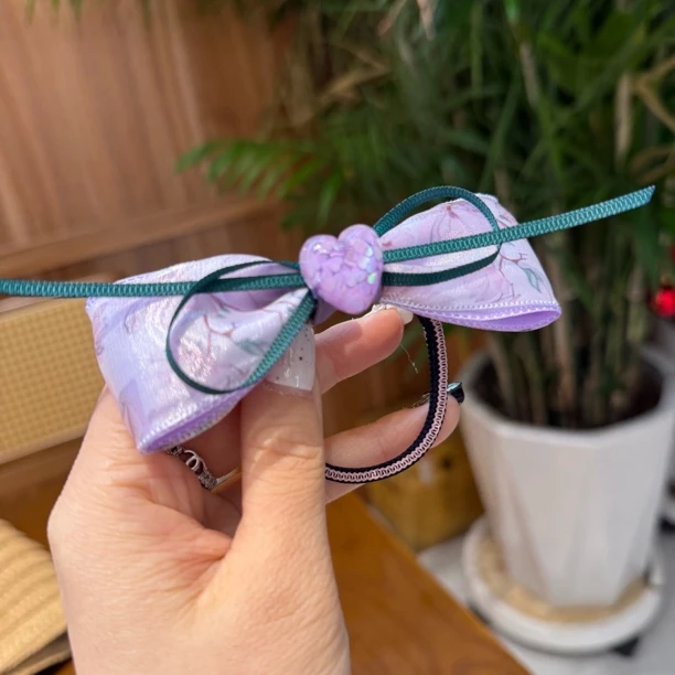 7758紫色碎花纱纱蝴蝶结皮筋