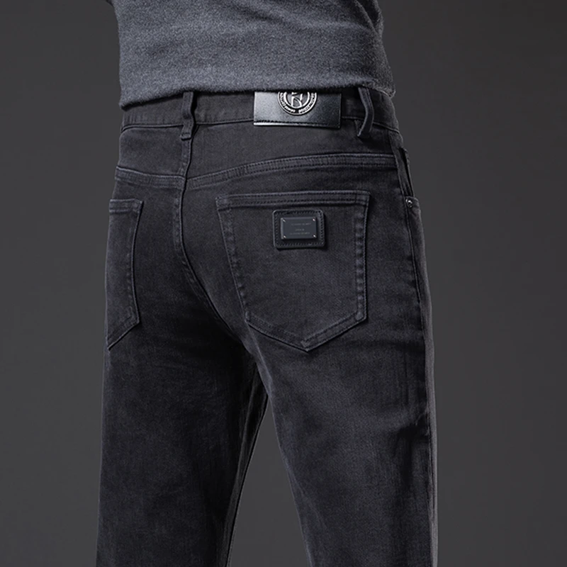 香港2025秋冬新款牛仔裤男士修身直筒弹力高端冬季黑色休闲长裤子