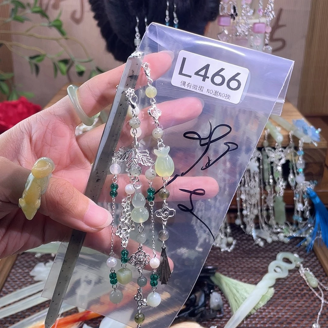 摘***星合金蛇纹石玉发饰