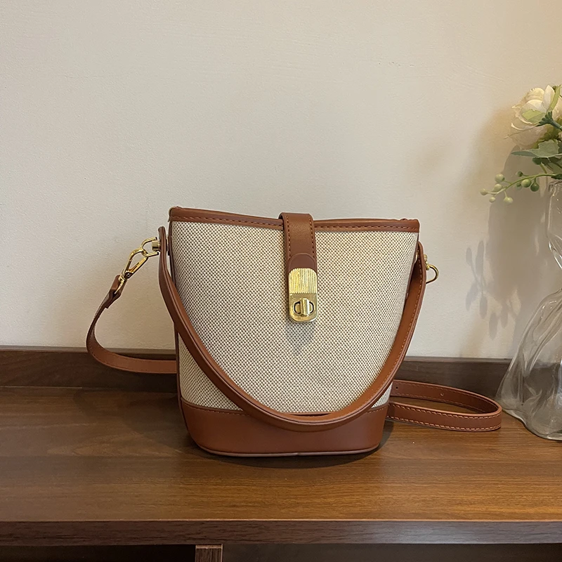 袋鼠蔓蔓雅源新款女士复古包包高级感斜挎包手提水桶包拼色单肩包