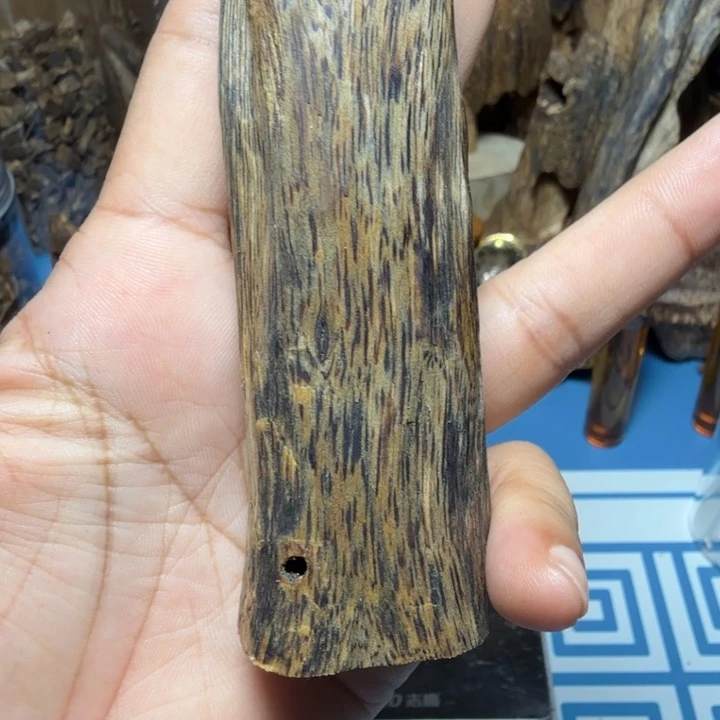 白奇乌身圆叶手把件32克