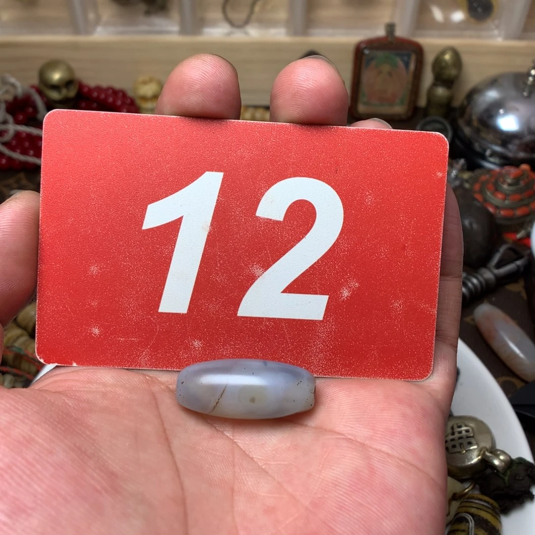 桃核吊坠鑫**n………………………………