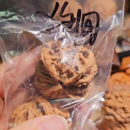 狼***腾吊坠文玩核桃44狮虎