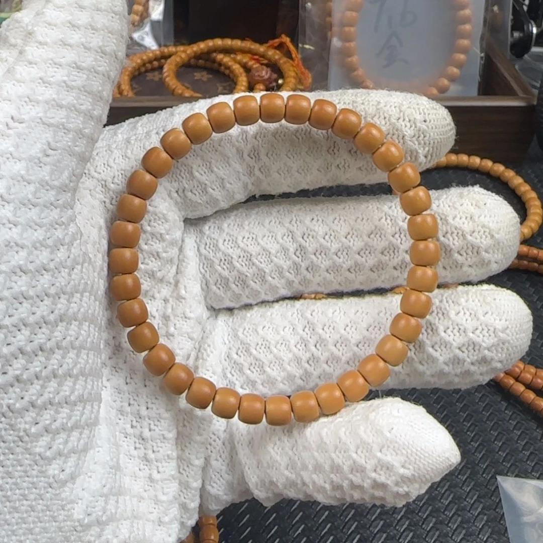 橄榄核吊坠咕**6.4mm清水极限弧单圈