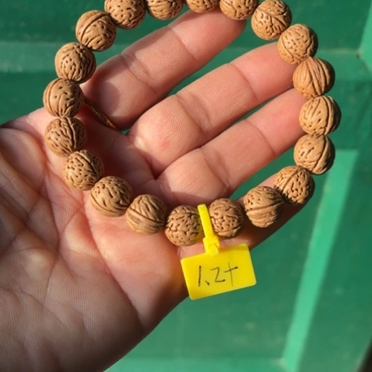 木质野生桃核手串