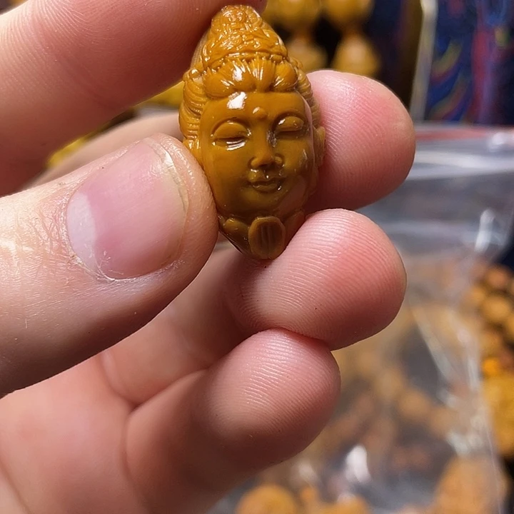 橄榄核手串他咯摸摸