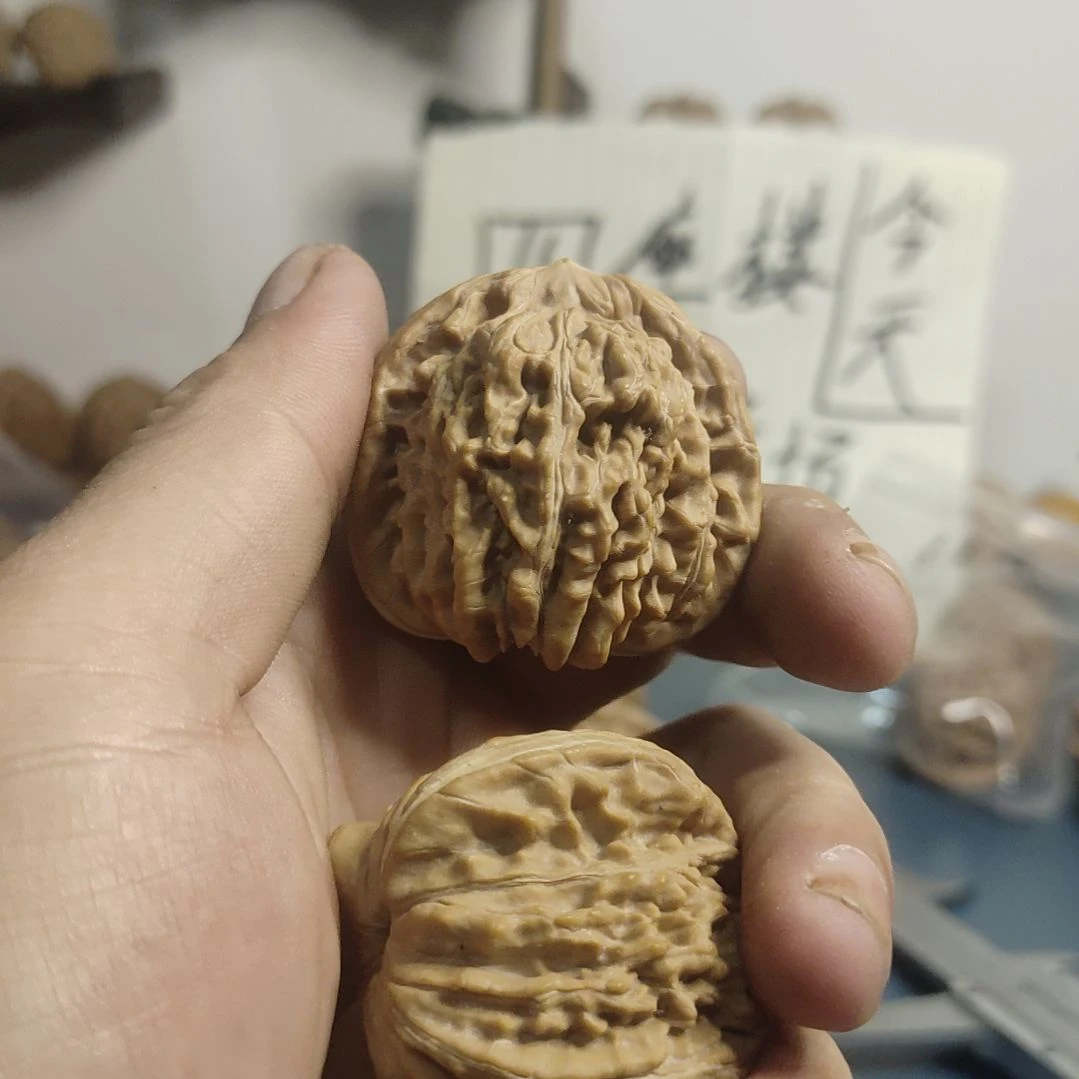 T***e核桃文玩核桃四座楼狮子头手把件