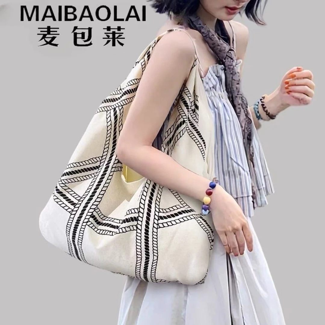 松弛感单肩斜挎包小众复古小马图腾手提包包高级感个性亚麻帆布包