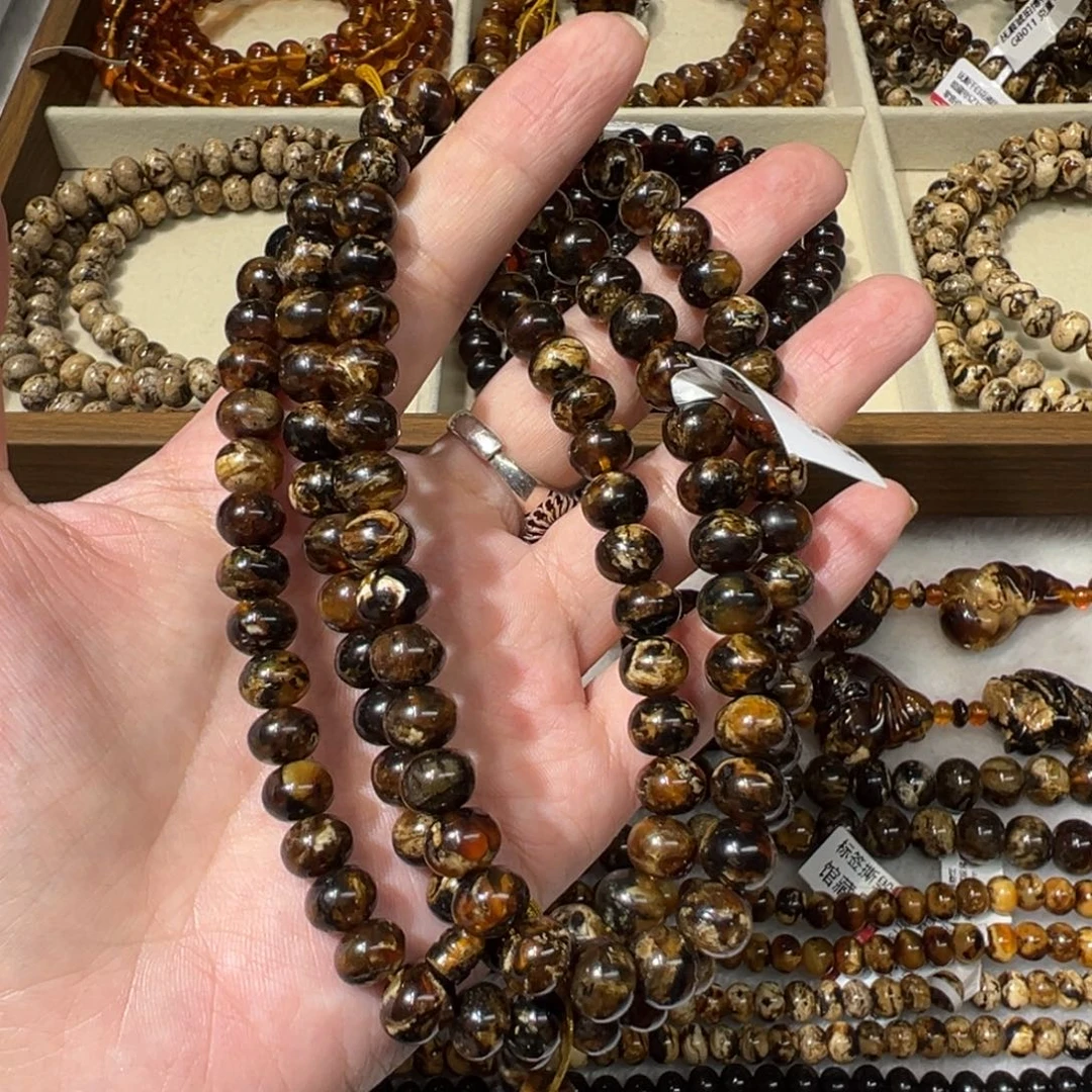 琥珀未镶嵌裸石抚顺琥珀9m108黑花蜡