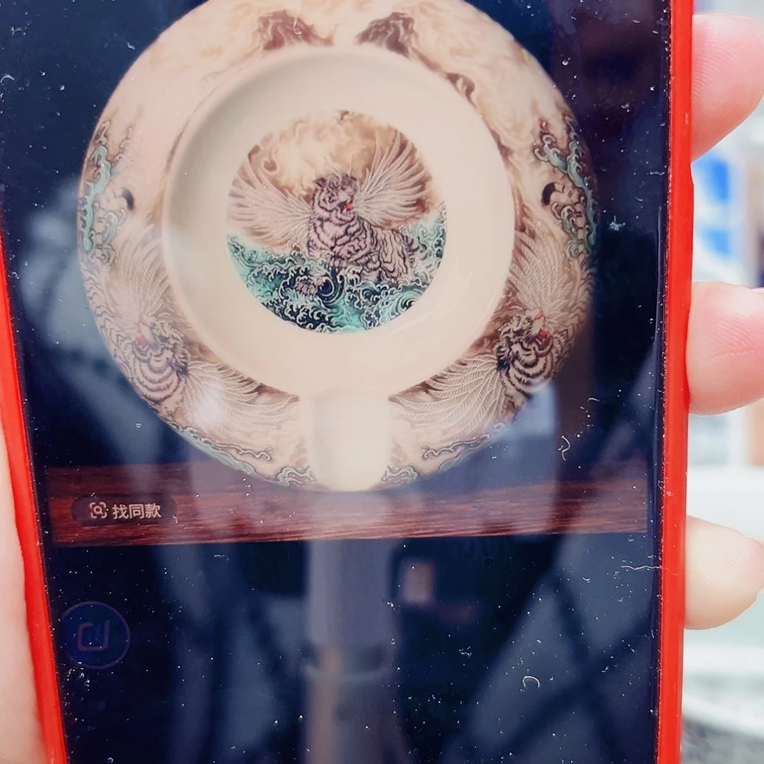 摆件丘*?景德镇市的一位老干部说他