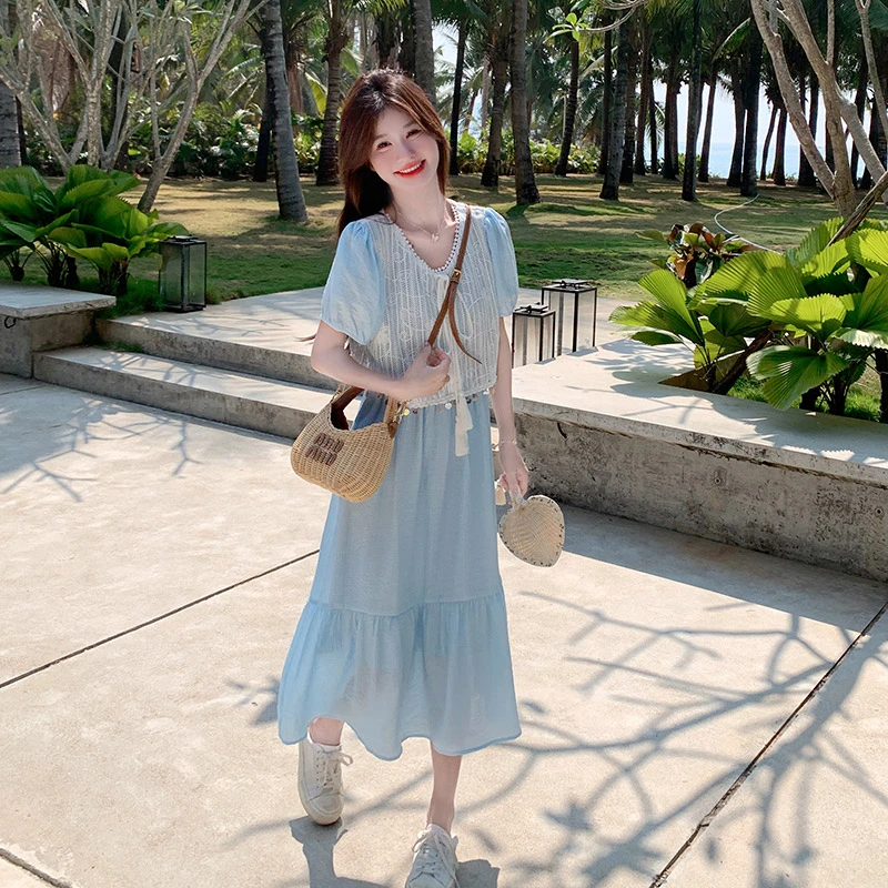 蓝色海边度假风连衣裙女2025夏季新款温柔假两件拼接泡泡袖A字裙