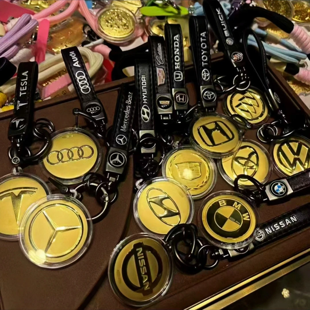 深圳水贝爆款热卖正品含金车标钥匙扣合集带钢印