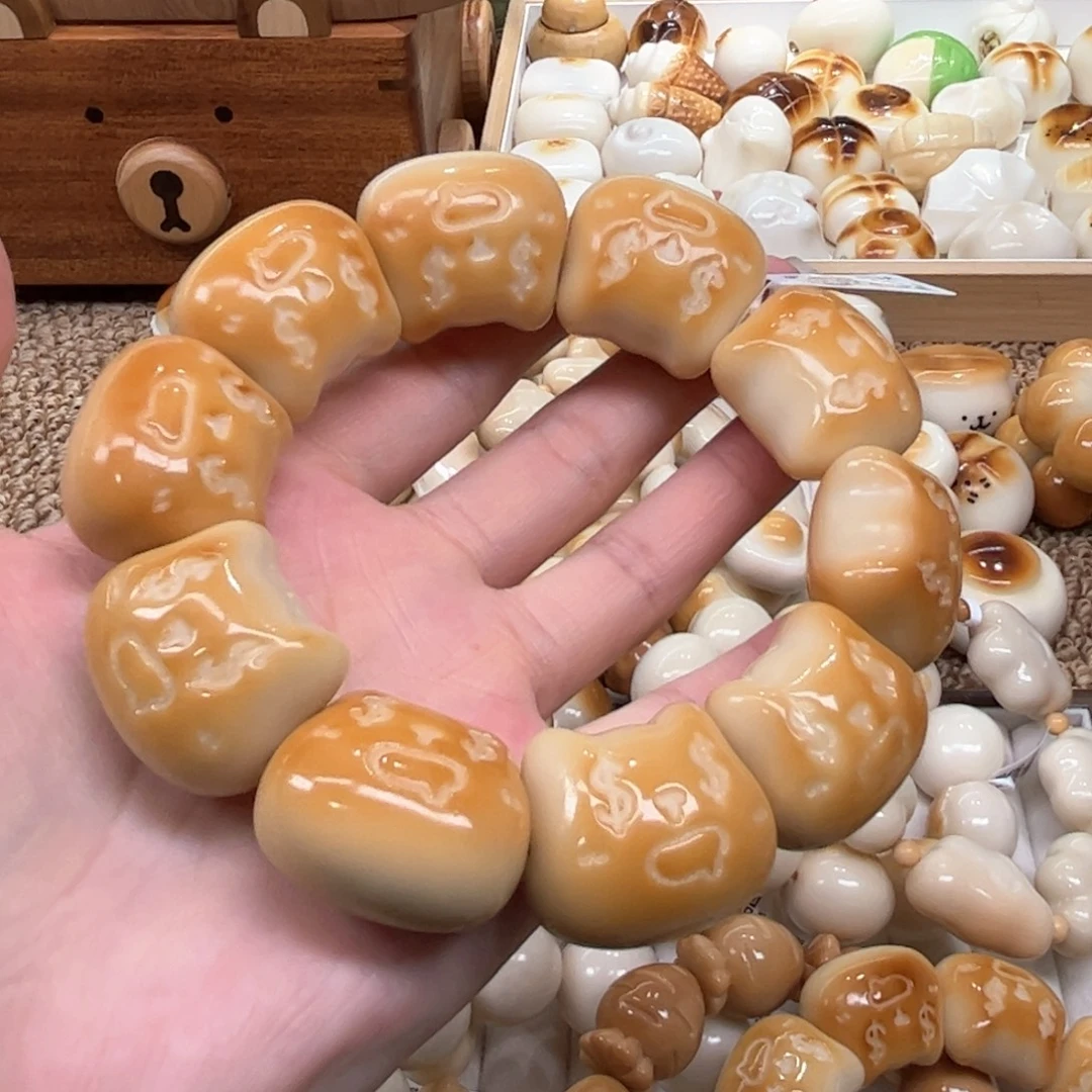 菩提根/象牙果手串9.26.21象牙果碳烤美金猫头微瑕
