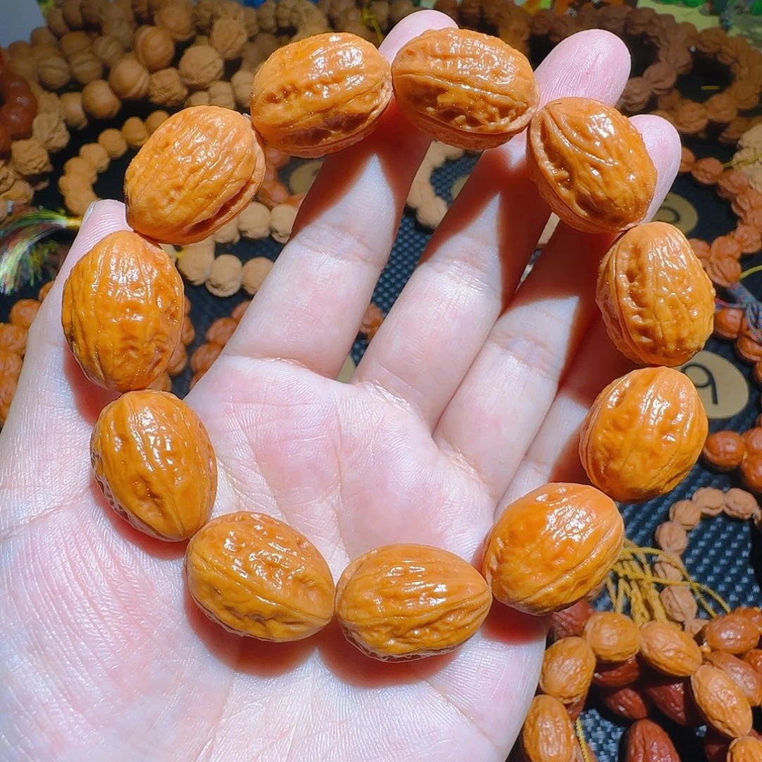 曲***、文玩核桃吊坠拉丝纹小枣