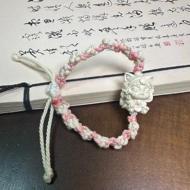 D654天然猛犸雕刻解忧兽编织手串可调节手围