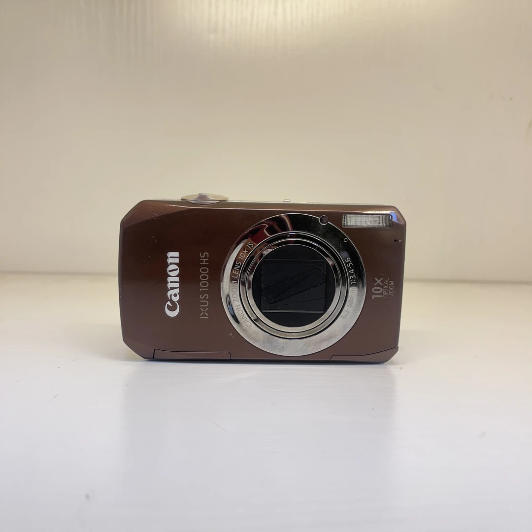 95新 Canon/佳能 ixus1000hs热门系列出片暖白皮机身有质感拍照