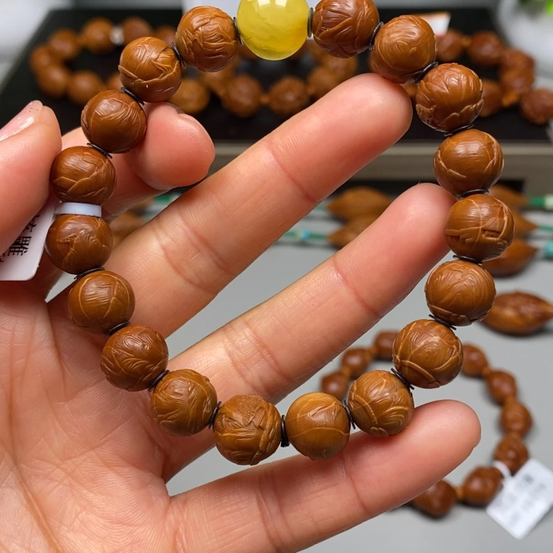 橄榄核吊坠观山手串