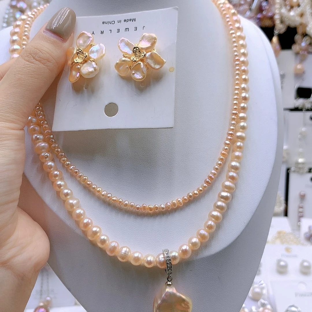 颈饰银S925镶嵌淡水珍珠草***丁