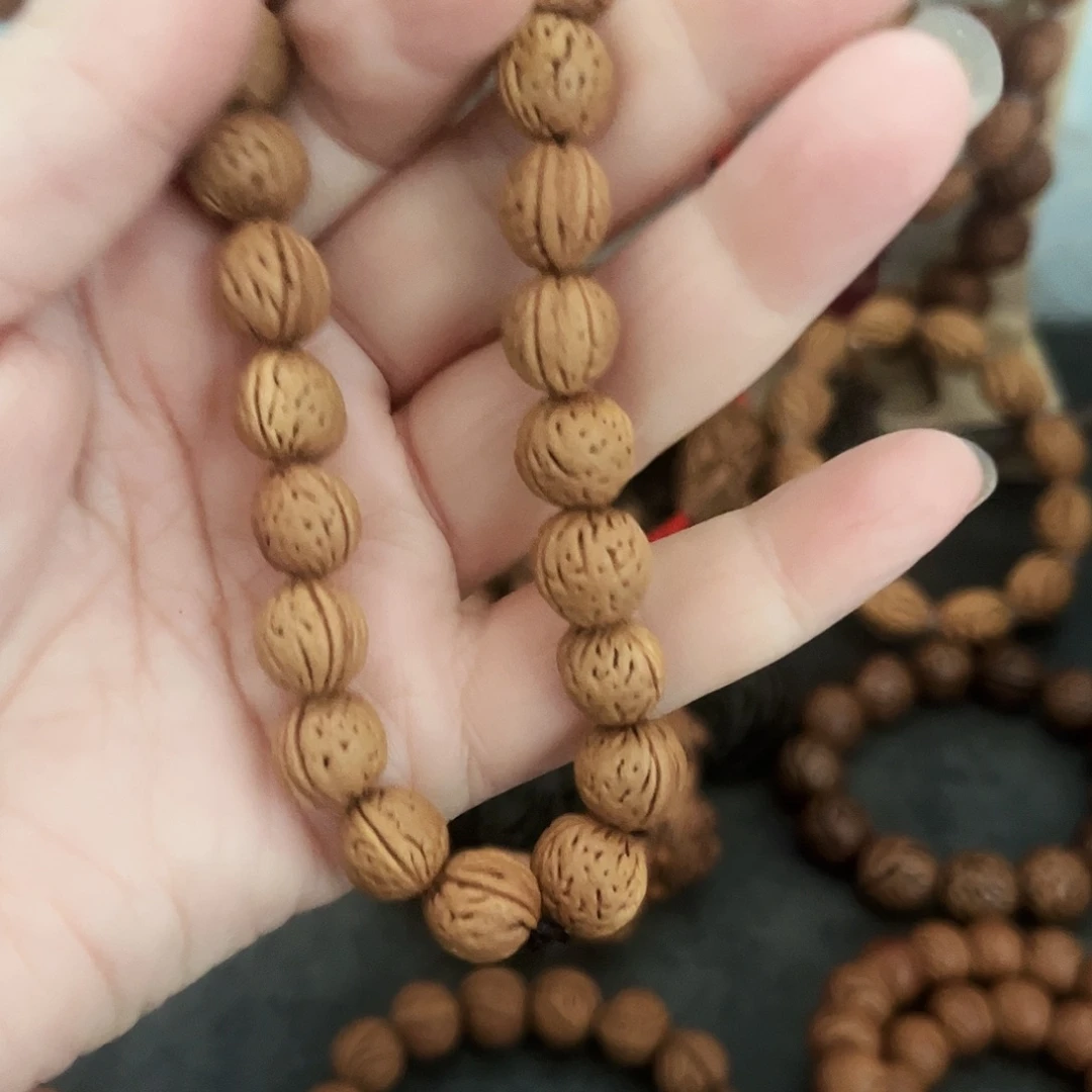 花****野生桃枭小籽手串