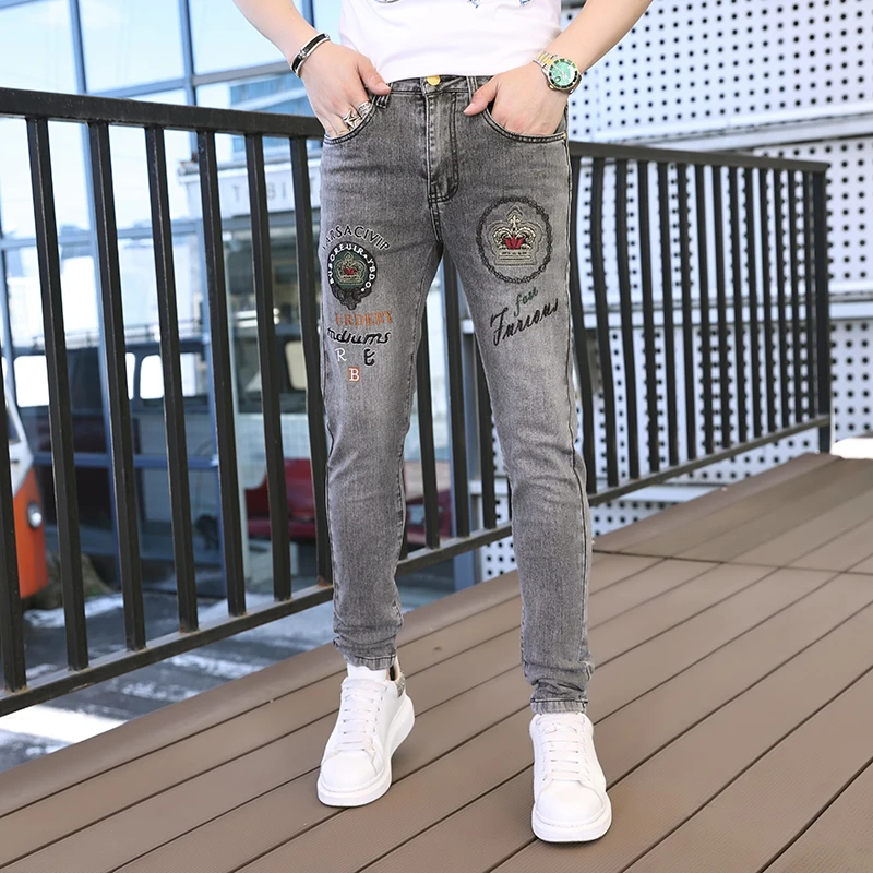 夏季欧货潮流刺绣小脚牛仔裤棉弹百搭破洞修身弹力九分牛仔裤韩版