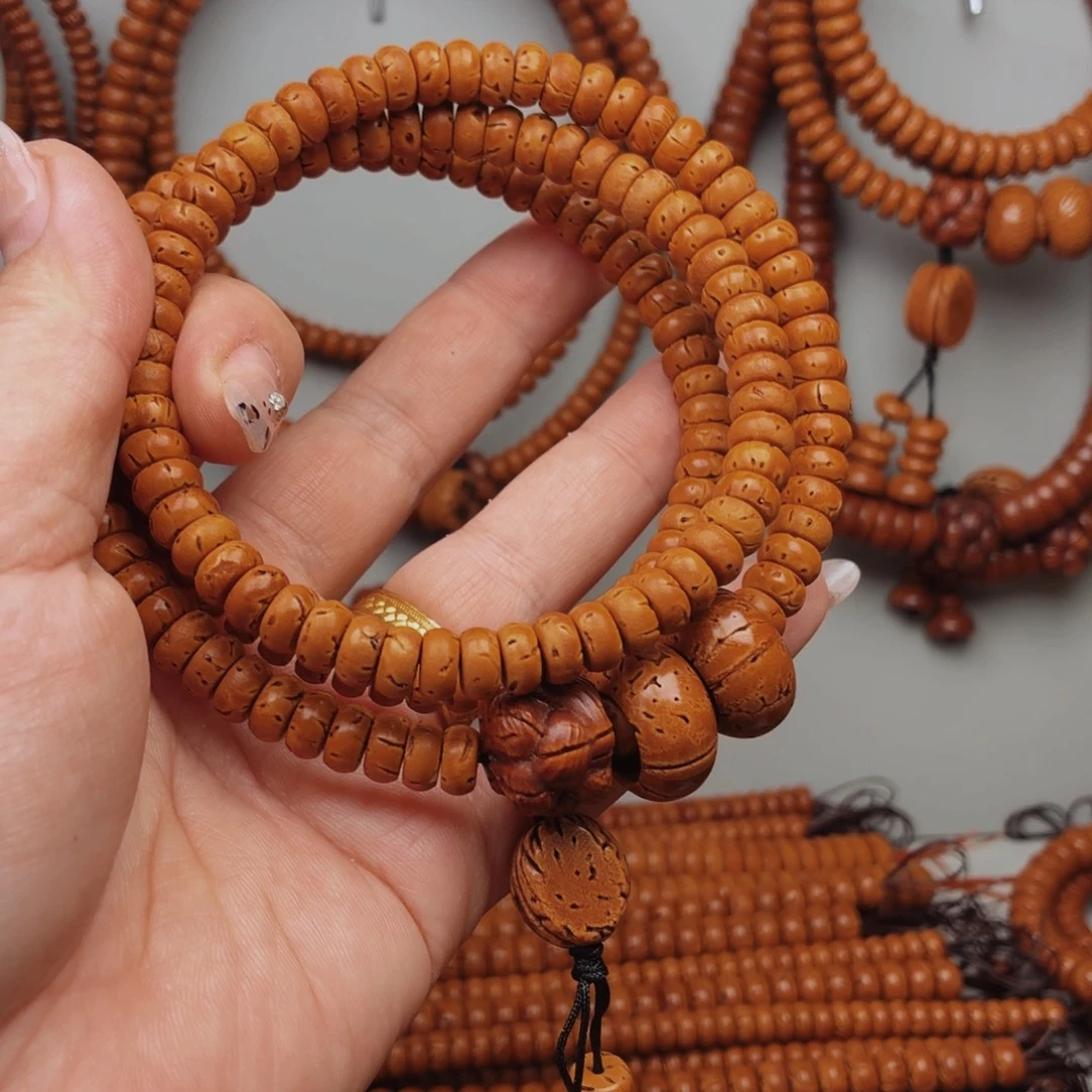 桃核手串166棵微瑕疵88