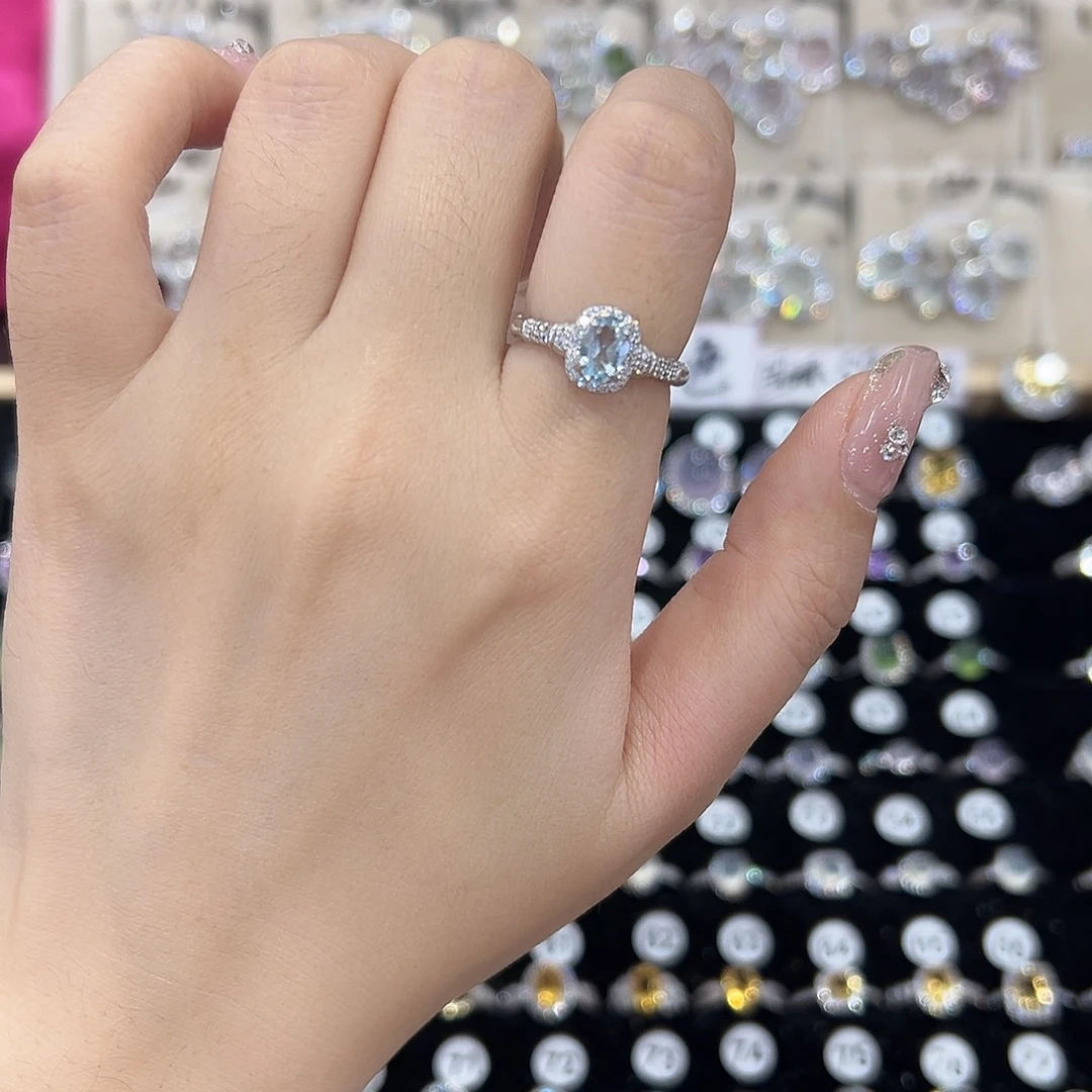 ****崽银S925镶嵌托帕石戒指