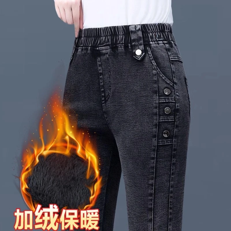 牛仔裤女冬季大码小脚裤松紧腰显瘦紧身加绒加厚铅笔裤胖mm长裤子