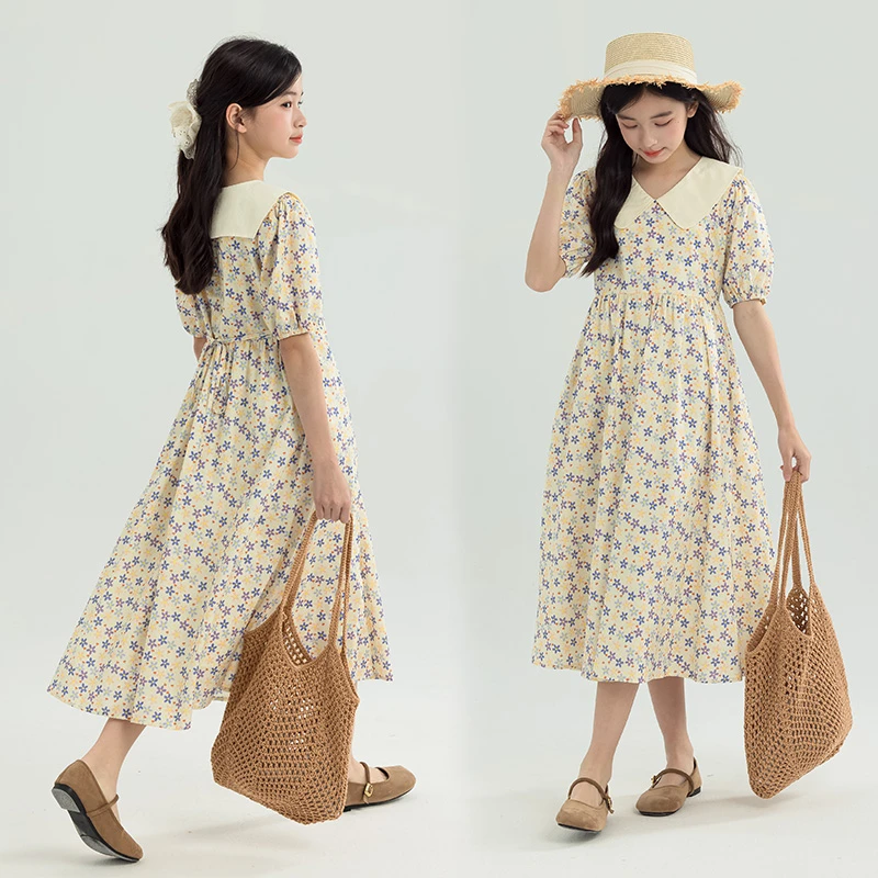 女童碎花连衣裙夏季新款娃娃领学院风泡泡袖亲子中长款大童公主裙