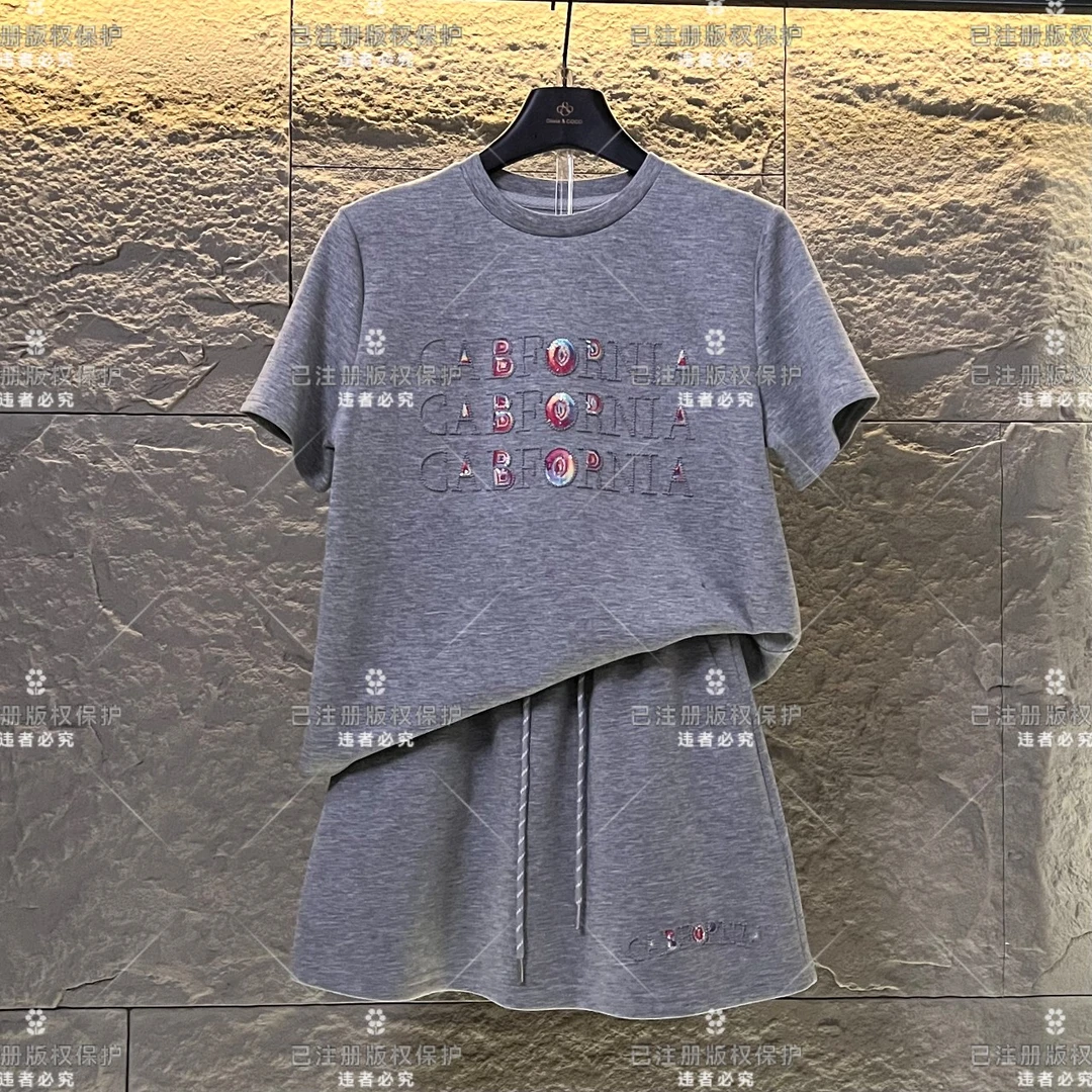 编码41梦梦WMA-A67丨字母钉珠轻奢宽松版夏季T恤短裙时尚套装