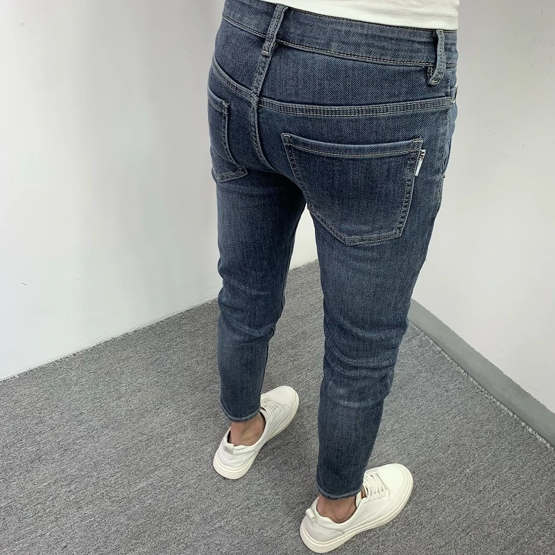 牛仔裤男春季新款韩版潮流修身小脚简约百搭弹力休闲斜口袋九分裤