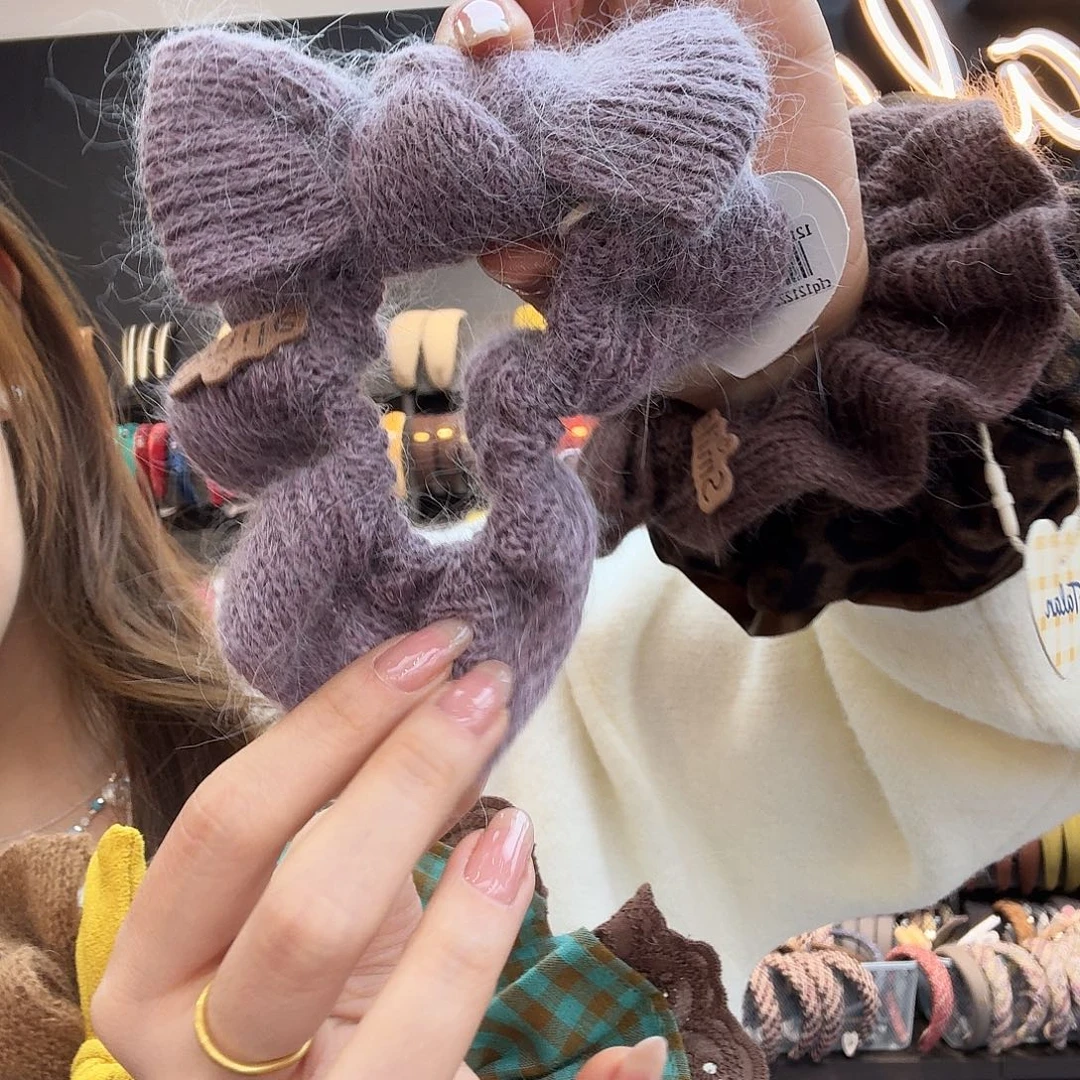 布艺非金属紫色蝴蝶结