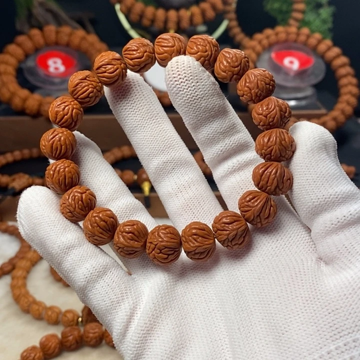 桃核吊坠北***吹秦岭龙纹