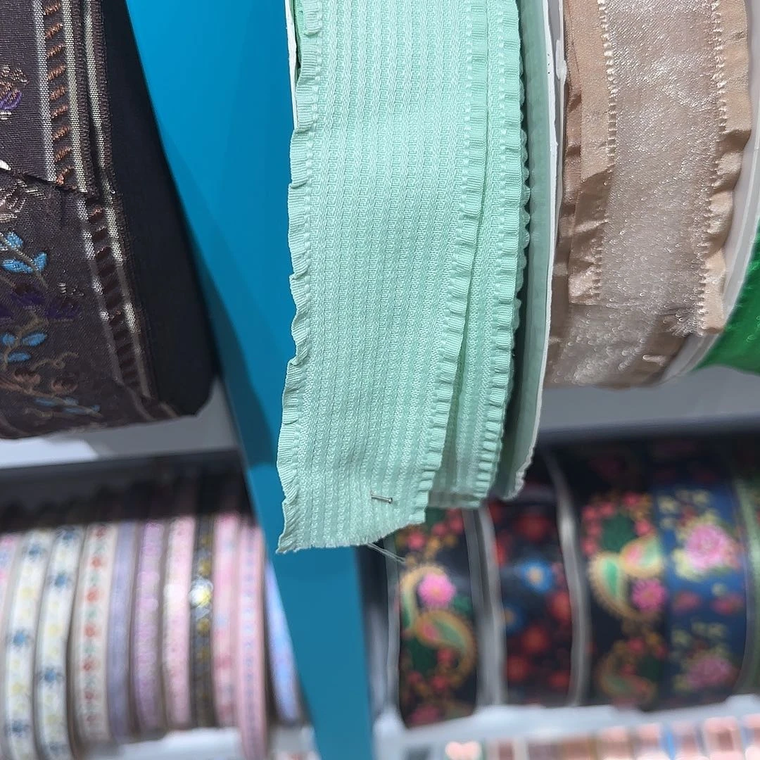 睿****饰服装辅料花边织带