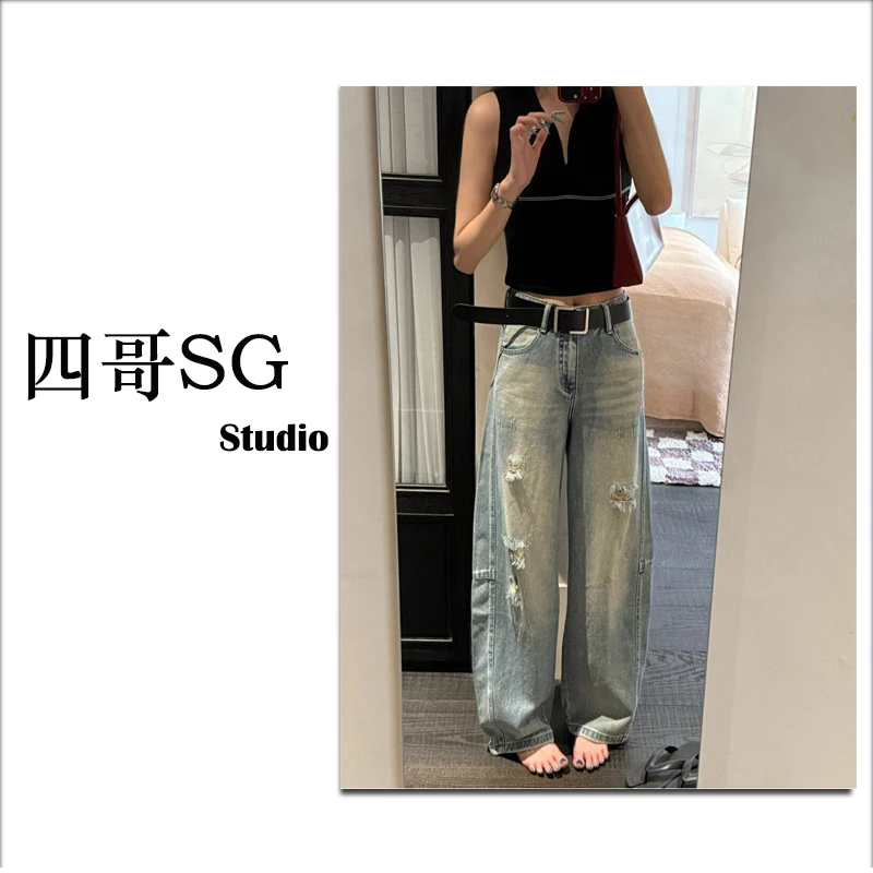 四哥SG~蓝色不规则磨破设计感弯刀牛仔裤女2025夏季牛仔裤设计感
