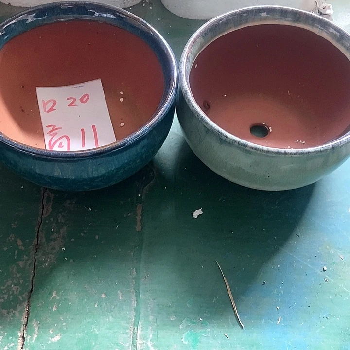 红陶口20。高11。。。。