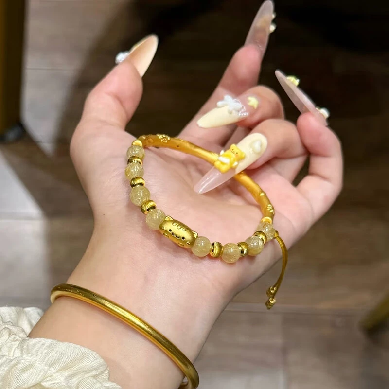 海上罗孚黄金面包小猫金发.晶半镯女新款999足金猫眼珠生日送女友