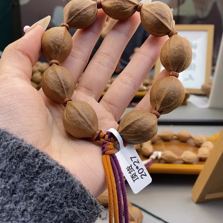 吊坠橄榄核阿*。梅林铁