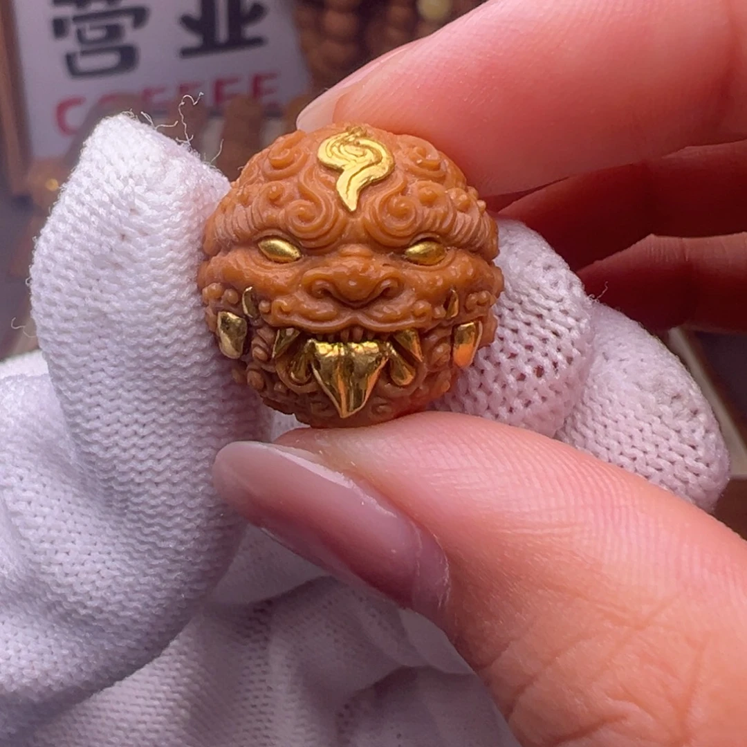 把件猴头核桃精修镶嵌金唐狮全品有正常封口线