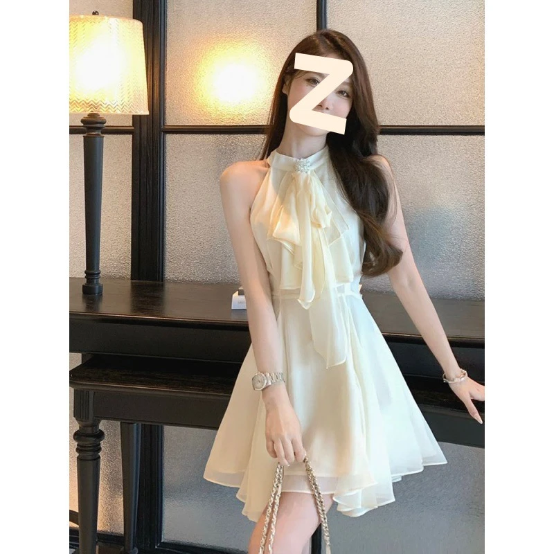 法式名媛不规则收腰无袖雪纺连衣裙女夏季2025新款性感挂脖短裙子