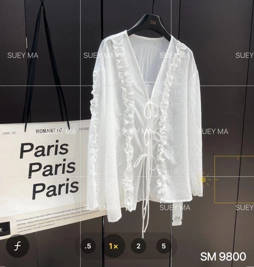 杨杨 SM-夏季新款木耳边时尚上衣9800