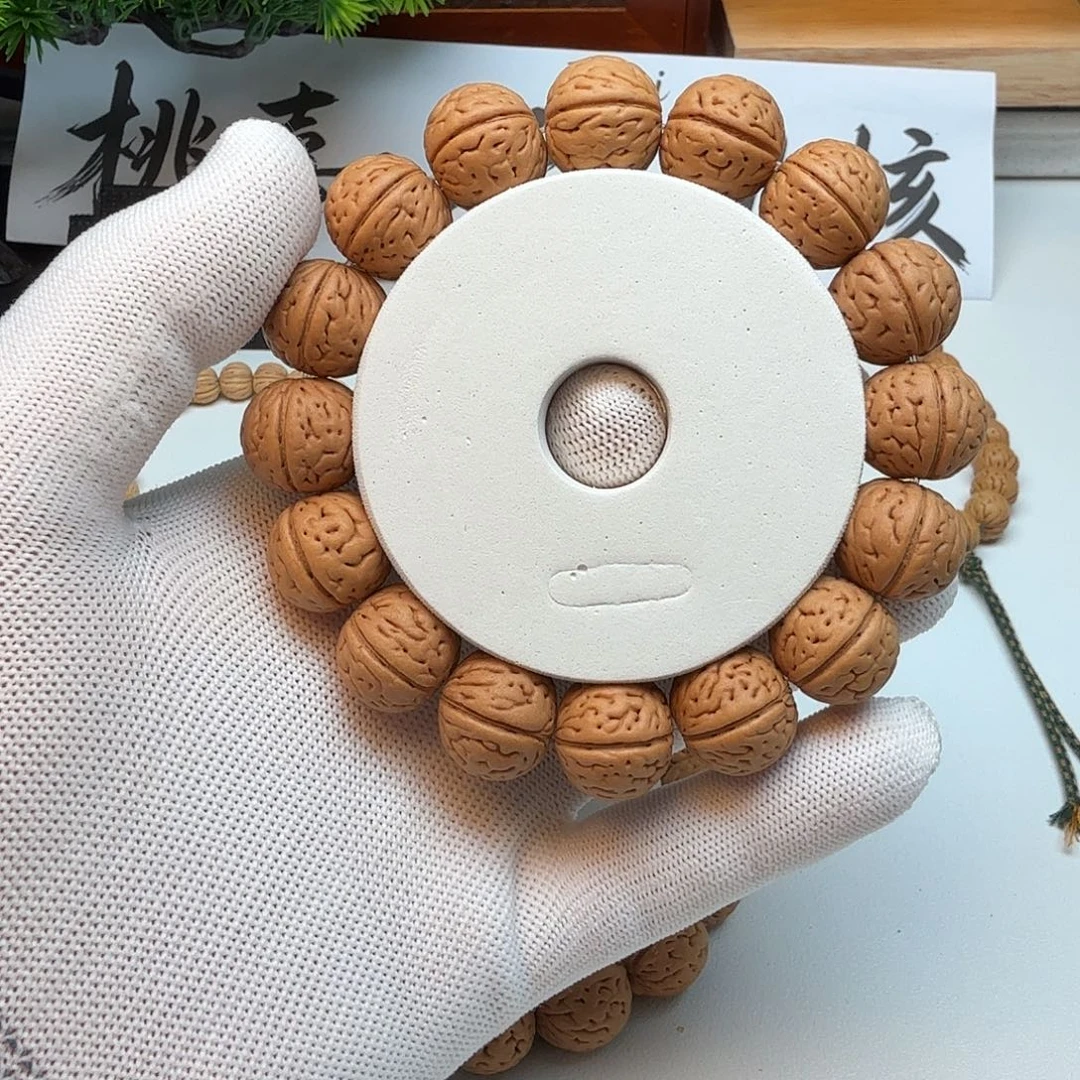 去***儿桃核手串17野生桃核