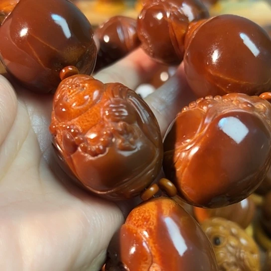 A***月手串/手链橄榄核玉化米勒佛手持一套卡32左右